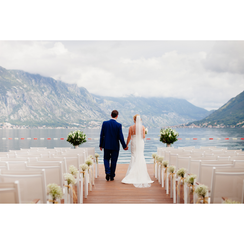 Couple at a lakeside wedding ceremony